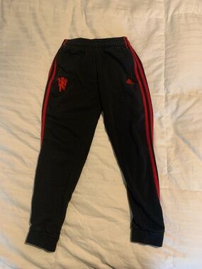 Manchester United adidas Black Joggers with Red Side Stripes